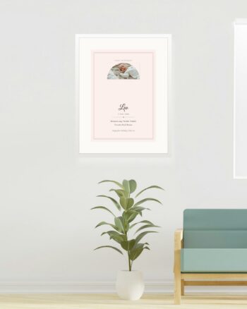 Personalised first birthday keepsake print, arch design, in a white frame with a mount by FONDLORE